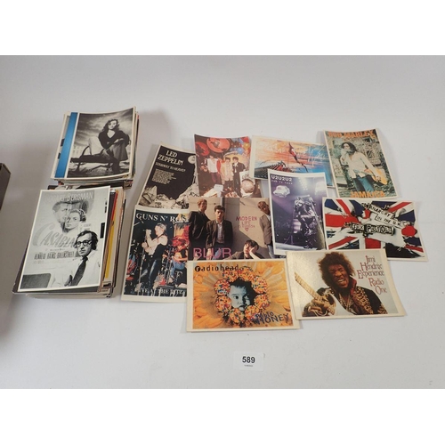 589 - A quantity of postcards relating to film, celebrities, pop stars, groups etc. (approx. 200)