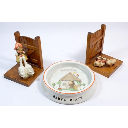 62 - A Baby bowl by Mabel Lucie Attwell and a pair of Goebel wood and ceramic bookends - one a/f