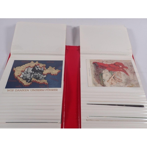 632 - A red album of military postcards including Hitler