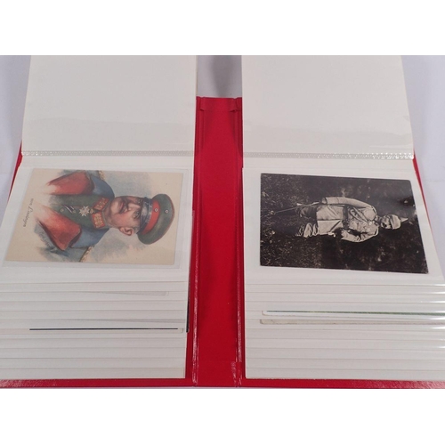 632 - A red album of military postcards including Hitler