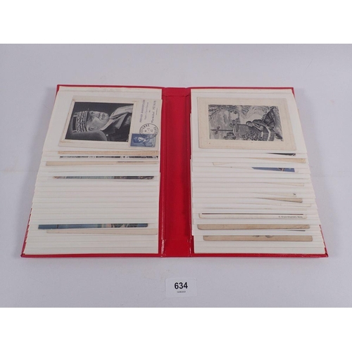 634 - A red album of military postcards and various silks (34)