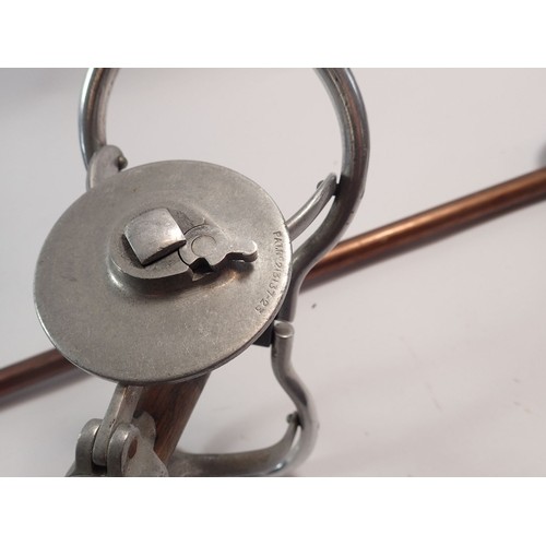 1080 - A wooden shooting stick with pat number, thought to be Swaine & Adeney together with a Gamebird shoo... 