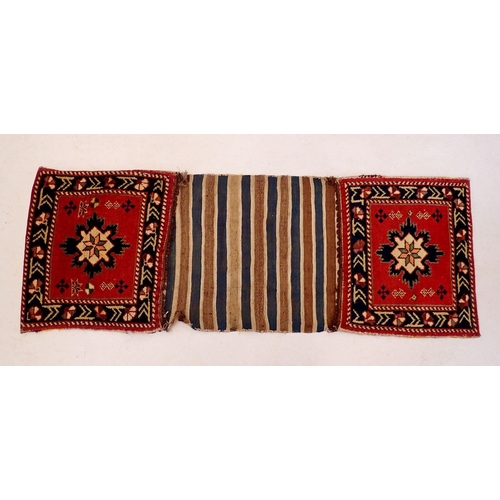 1073 - A Turkoman style saddle bag, 125 x 46cm