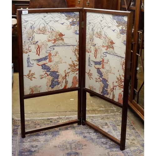 1102 - A 19th century mahogany two fold fire screen with chinoiserie printed fabric