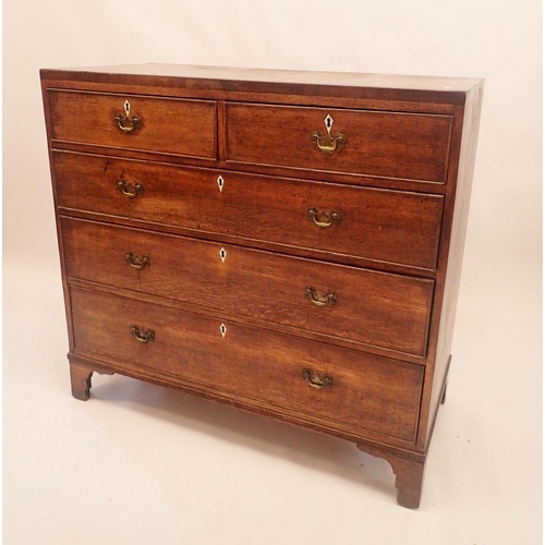 1115 - A Georgian oak chest of two short and three long drawers with bone escutcheons 108x100x50cm