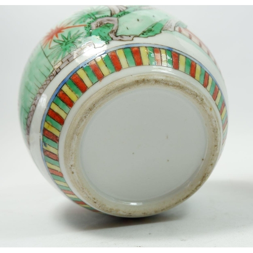 184 - A 19th century Chinese famille verte ginger jar and cover painted man on a roof climbing into a gard... 