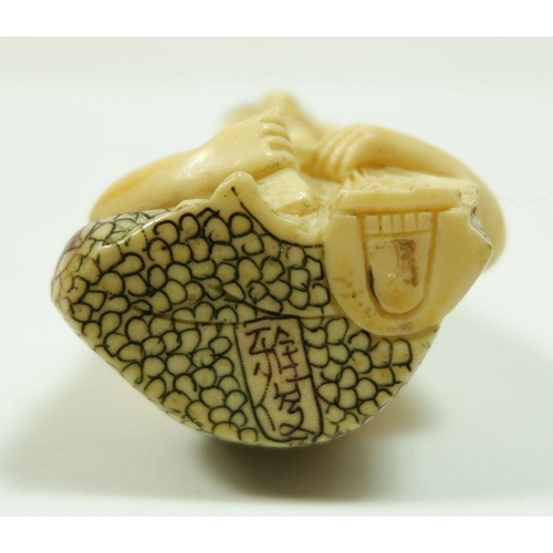 186 - A Japanese composition netsuke 'Masatoshi' signed on the base
