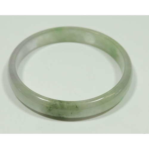 199 - A Chinese jade bangle, 8.2cm outer diameter