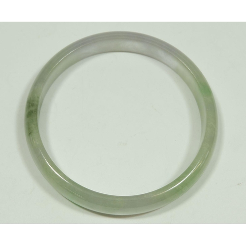 199 - A Chinese jade bangle, 8.2cm outer diameter
