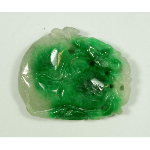 203 - A Chinese carved jade pendant decorated monkey, peach and gourd, 5.5 x 4.5cm