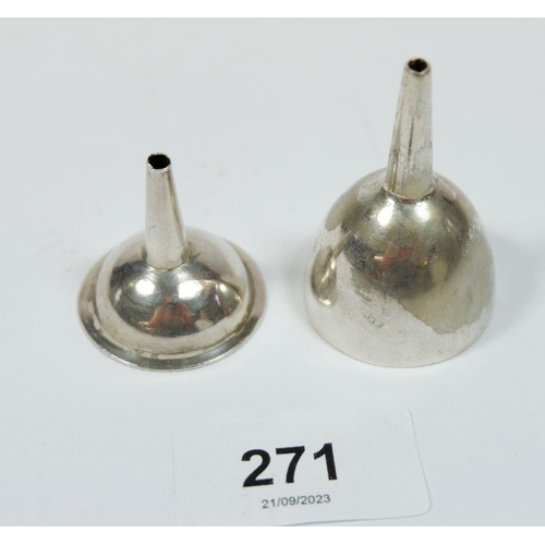 271 - Two silver plated miniature wine funnels and a white metal part eastern cruet set