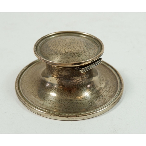 329 - A silver capstan inkwell, Birmingham 1928, 10cm diameter