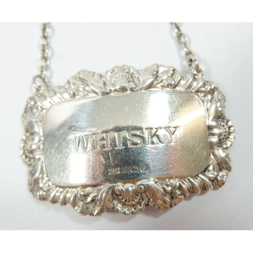 334 - Three silver decanter labels: Whisky, Brandy & Port