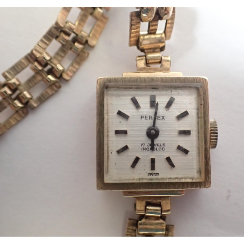 538 - A Perfex Art Deco 9 carat gold square faced ladies wrist watch on rolled gold strap