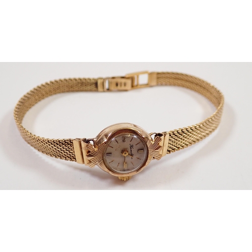 539 - A Hamilton 9ct gold ladies wrist watch on 18ct gold strap, total 18.8g