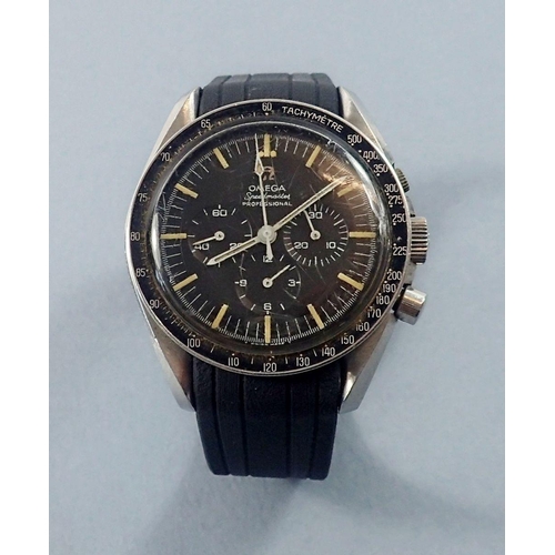 545 - An Omega Speedmaster professional wrist watch with three secondary dials and yellow batons (the type... 