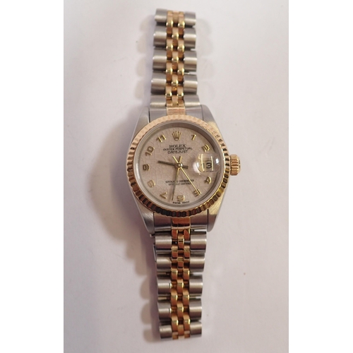 551 - A Rolex ladies Oyster Datejust gold and stainless steel wrist watch 