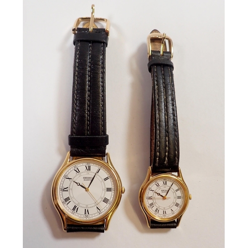 566 - A pair of Seiko quartz ladies and gentleman's wrist watches