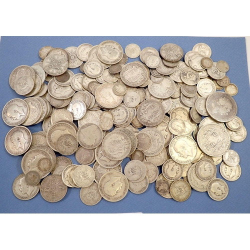 588 - A quantity of British silver coinage pre 1920 including: silver threepences, sixpences, shillings, f... 