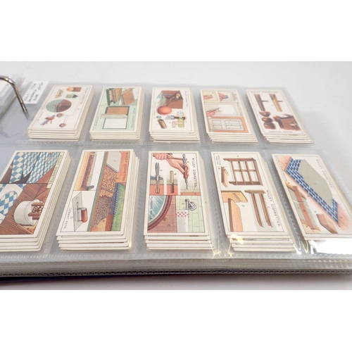 681 - An album of 25 sets of cigarette cards including Players Aircraft, Wild Animal Heads etc. cat value ... 