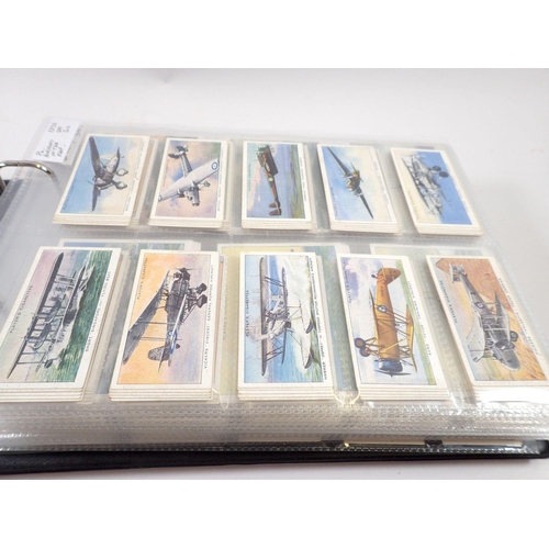 683 - An album of twenty one sets of cigarette cards including Players Aircraft of the RAF, cat value £550