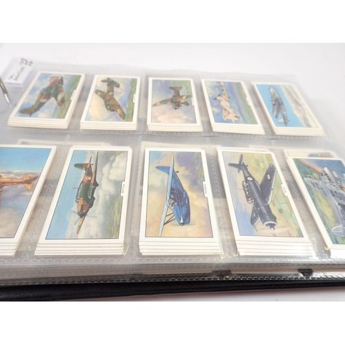 683 - An album of twenty one sets of cigarette cards including Players Aircraft of the RAF, cat value £550