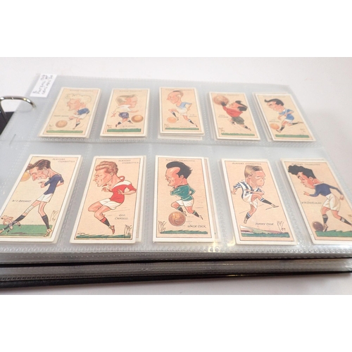 684 - An album of football themed cigarette cards, sets and odds, cat value £1000