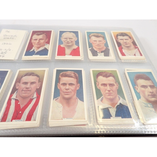 684 - An album of football themed cigarette cards, sets and odds, cat value £1000