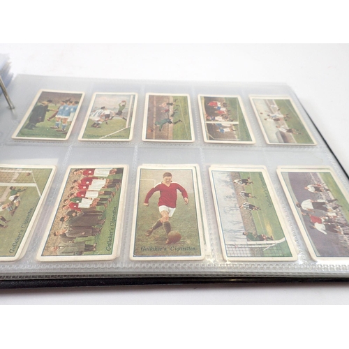 684 - An album of football themed cigarette cards, sets and odds, cat value £1000