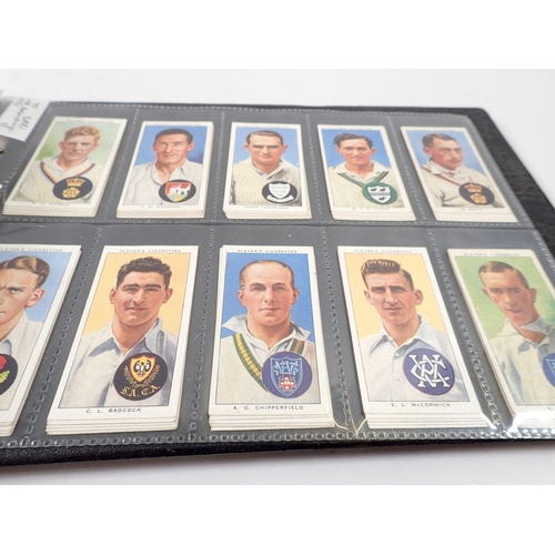 684 - An album of football themed cigarette cards, sets and odds, cat value £1000