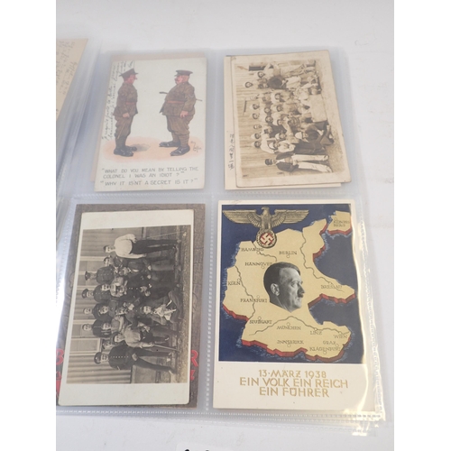 693B - A group of military postcards including Hitler and silks (25)