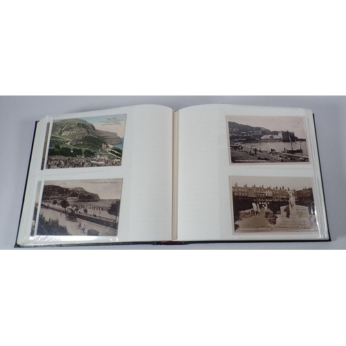 695 - An album of postcards, mixed subjects but mainly topographical, with some early cards, (200)