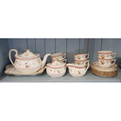 80 - A Wedgwood Williamsburg tea service comprising: teapot, milk, sugar, six cups and saucers, six tea p... 