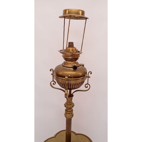 921 - A Victorian brass standard lamp converted from an oil lamp 144cm tall