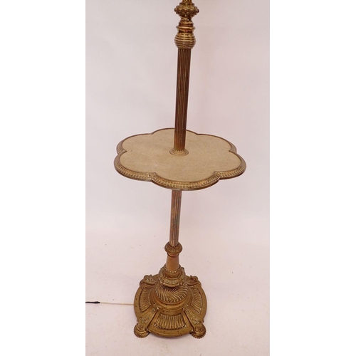921 - A Victorian brass standard lamp converted from an oil lamp 144cm tall
