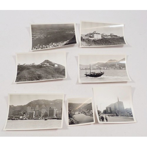 696 - A collection of nineteen black and white photographs of Hong Kong Harbour etc.