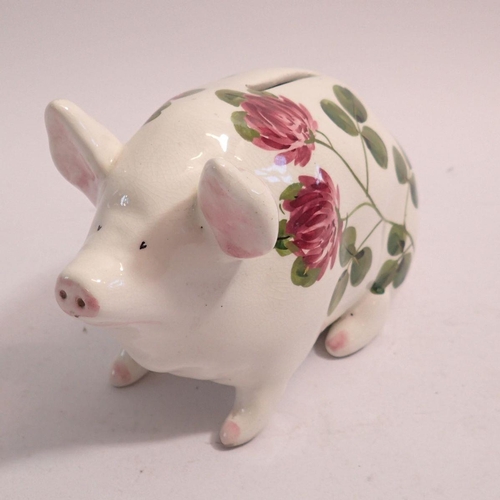 102 - A Plichta pig money box painted clover, 15cm