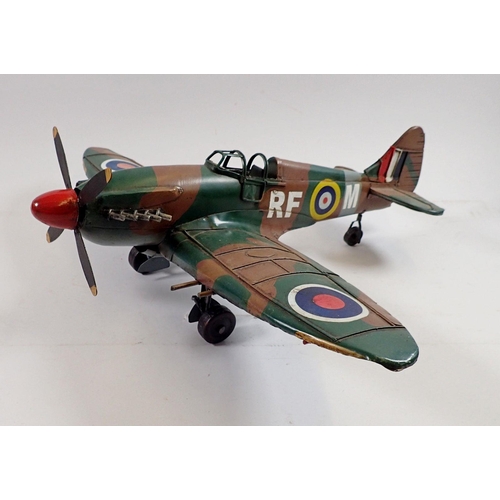 1063 - A large painted metal model Spitfire, 40cm long