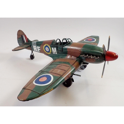 1063 - A large painted metal model Spitfire, 40cm long