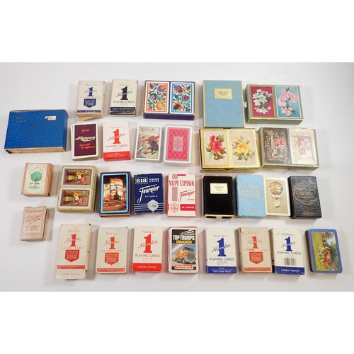 1064 - A quantity of Waddingtons playing cards plus eight boxed sets of cards by Congress