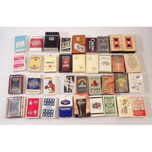 1065 - A quantity of alcohol and tobacco advertising playing cards