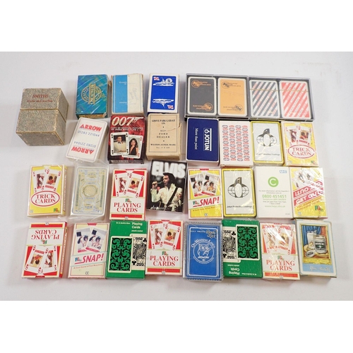 1069 - A box of advertising playing cards