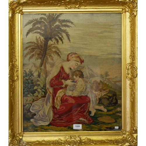 1088 - A Victorian tapestry picture depicting woman and child travelling in Mediterranean landscape, 54 x 4... 