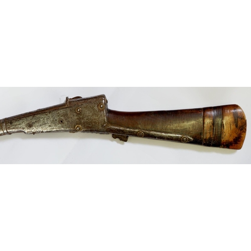 1097 - A 19th century Turkish musket with gilt metal studded decoration and engraving, 157cm long