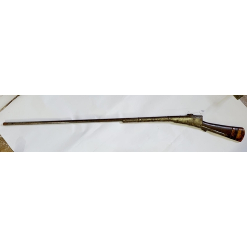 1097 - A 19th century Turkish musket with gilt metal studded decoration and engraving, 157cm long