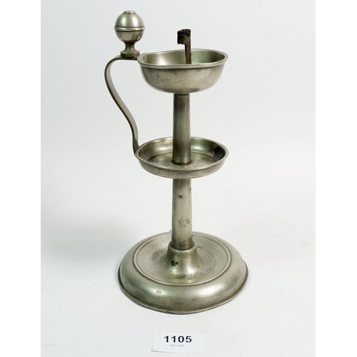 1105 - A 19th century primitive pewter oil lamp with wick holder, 23cm tall