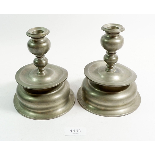 1111 - A pair of Norwegian pewter candlesticks, 16cm tall