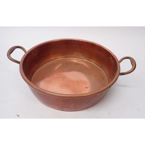 1121 - A 19th century two handled copper preserving pan