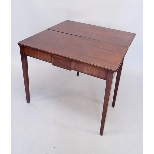 1123 - A Georgian mahogany fold top tea table on square supports, 91 x 45cm