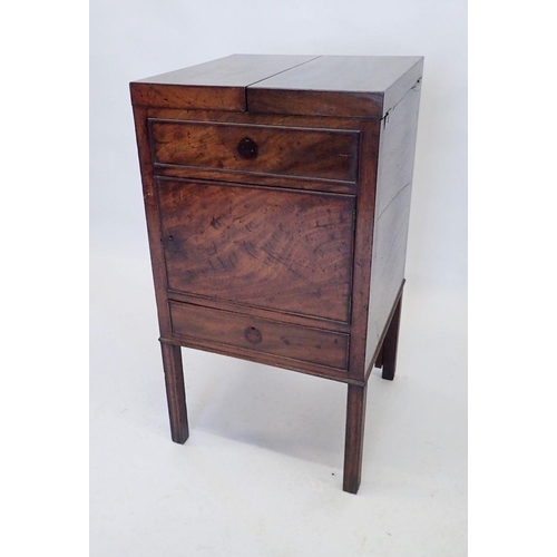 1126 - A Georgian mahogany washstand with twin flap top revealing fitted interior and rise top mirror frame... 